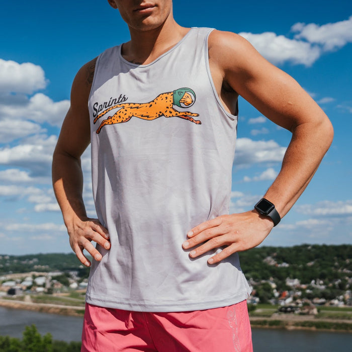 Runner wearing the Mens Running Tank in Victory Sprints print