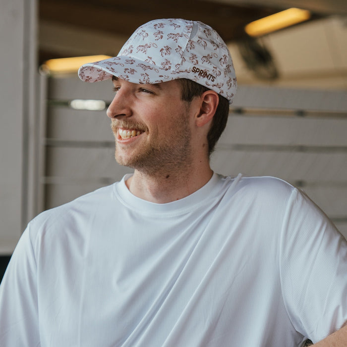 Runner wearing the My First Rodeo OG Hat
