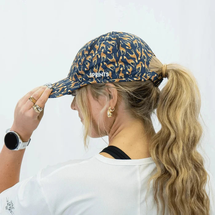 Person wearing the Neck Level Giraffes OG Hat