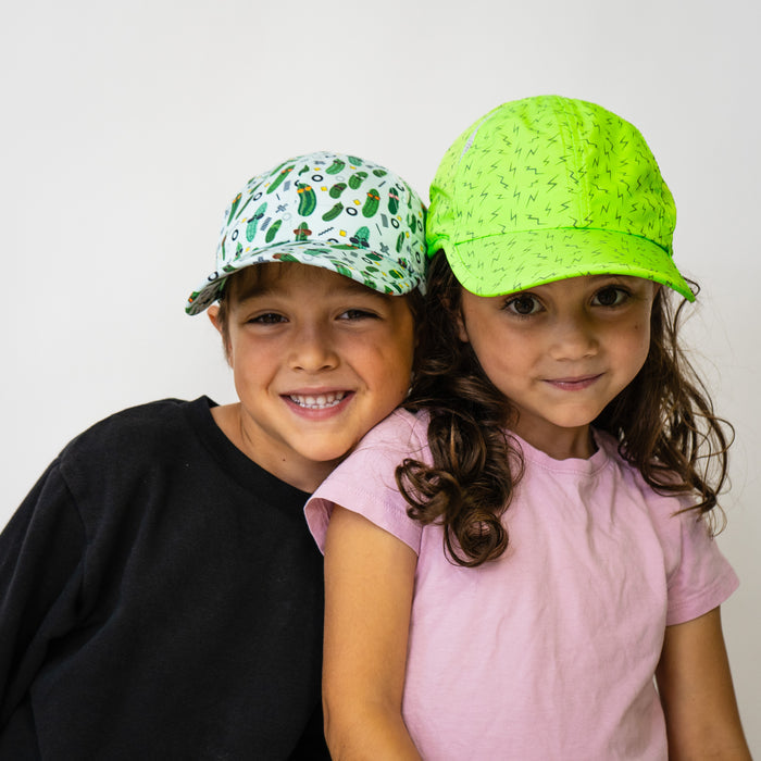 Child wearing the Neon Flash Reflective Green Lil OG Hat