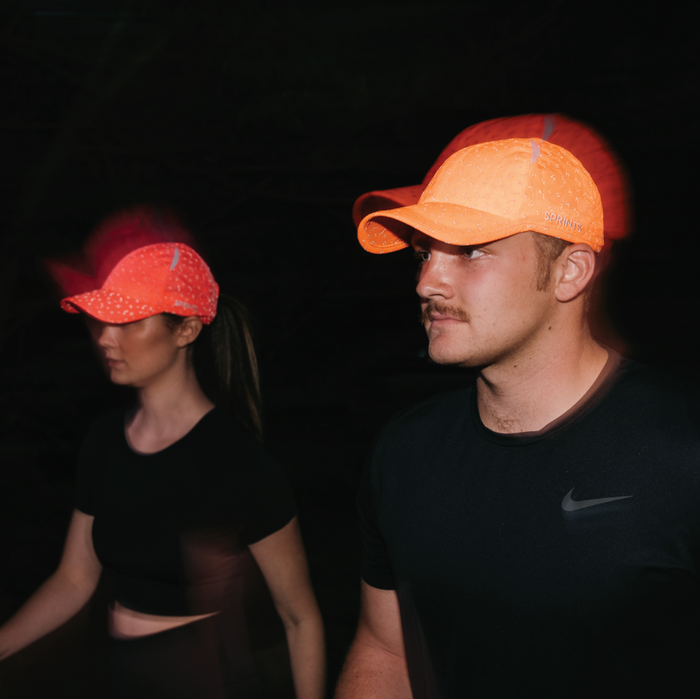Close-up of the Neon Flash Reflective Orange OG hat