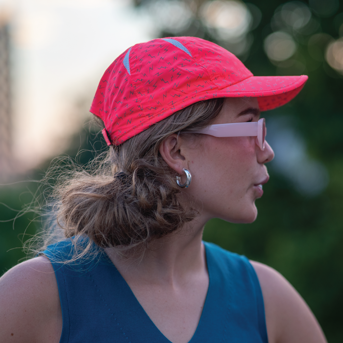 Close-up of the Neon Flash Reflective Pink OG hat