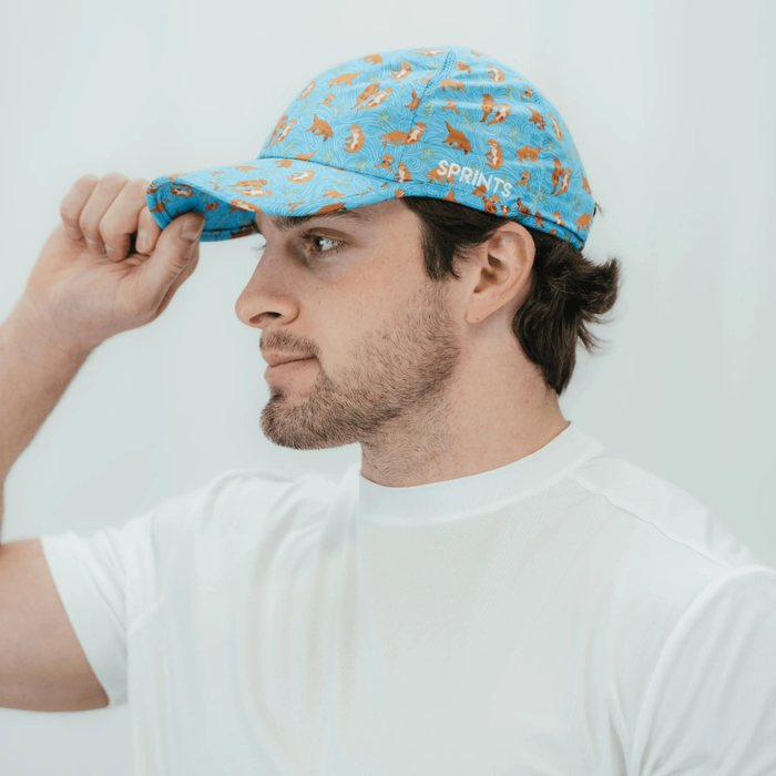 Close-up of the otter print pattern on the Otterly Awesome OG Hat