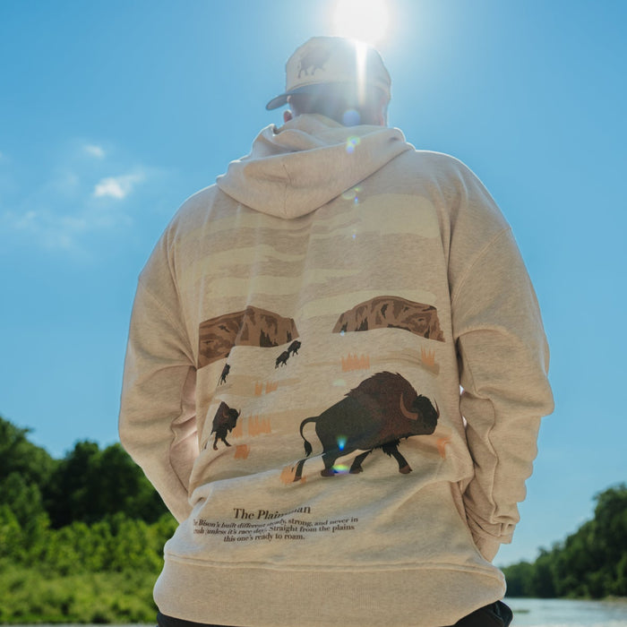 Person wearing the Oversized Hoodie in Plainsman print, side view