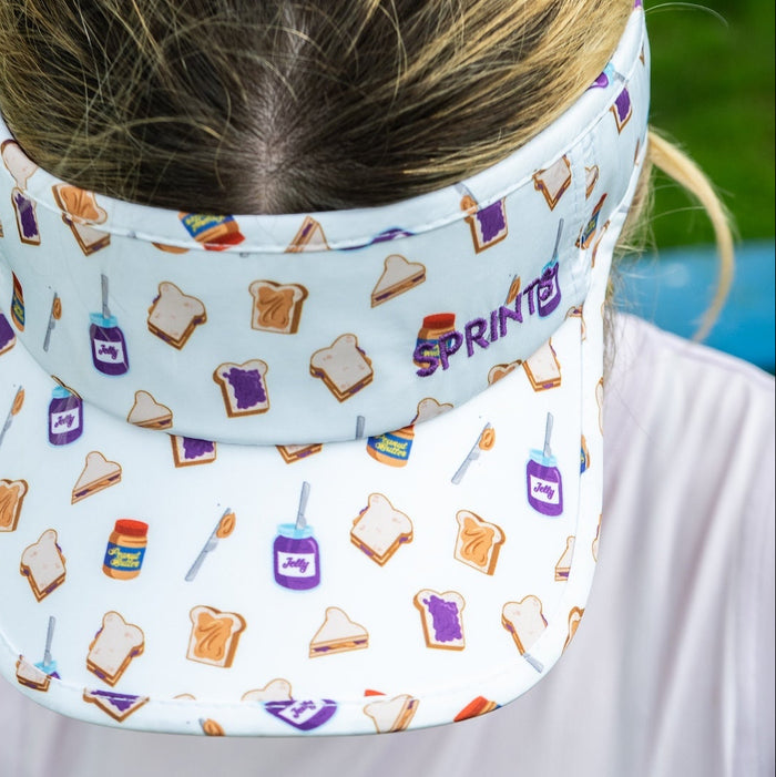 Runner wearing the Peanut Butter Jelly Timed Visor