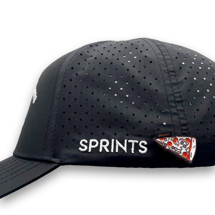 Pepper's Pizza Pie Topper Enamel Pin attached to a hat brim