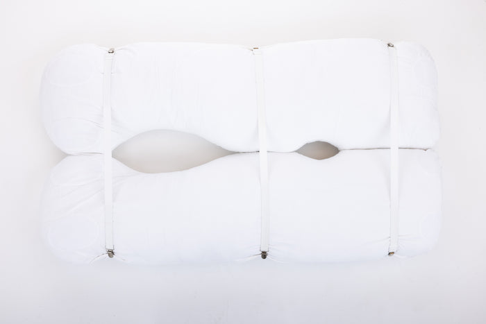 Four white pillow straps with clasps, displayed against a white background, arranged parallel to each other with clasps facing the same direction.