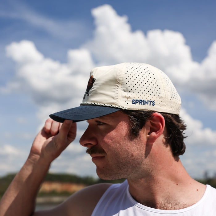 Runner wearing the Plainsman EZ Rope Snapback Hat, side view
