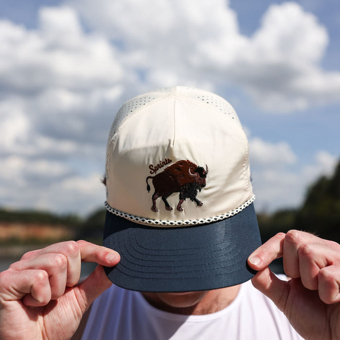 Runner wearing the Plainsman EZ Rope Snapback Hat outdoors