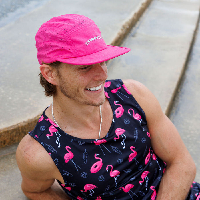 Runner wearing the Powered Up Blaz5 Flat Brim Hat