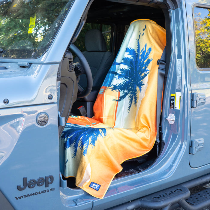 Retro Sunset Car Seat Cover Towel installed on a car seat headrest