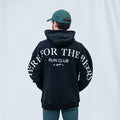 Person wearing the Run Club Oversized Hoodie in Here for the Beers Black