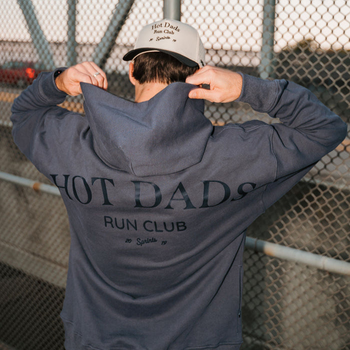 Person wearing the Run Club Oversized Hoodie in Hot Dads Gray