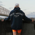 Person wearing the Run Club Oversized Hoodie in Hot Moms Navy