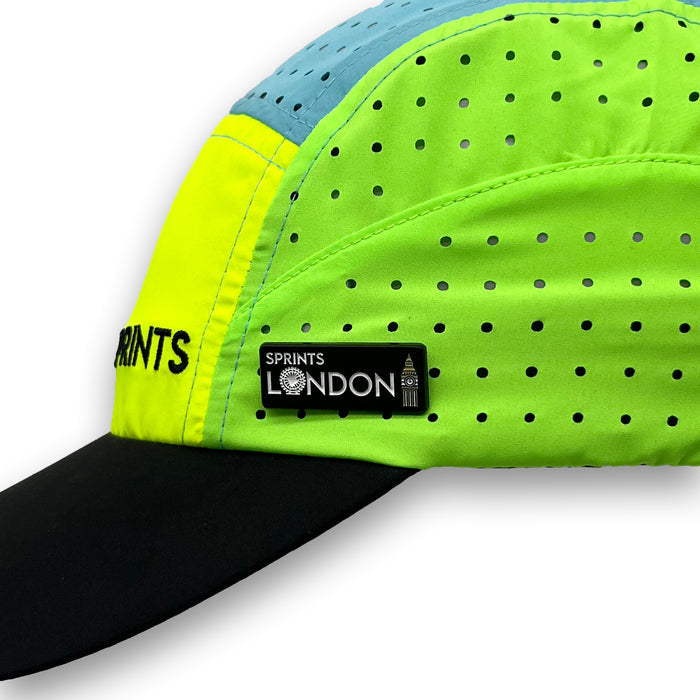 Run London Enamel Pin attached to a hat brim