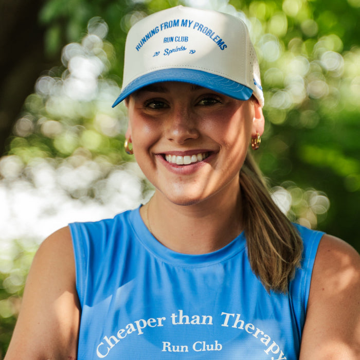 Person wearing the Running From My Problems Run Club Structured VP Hat