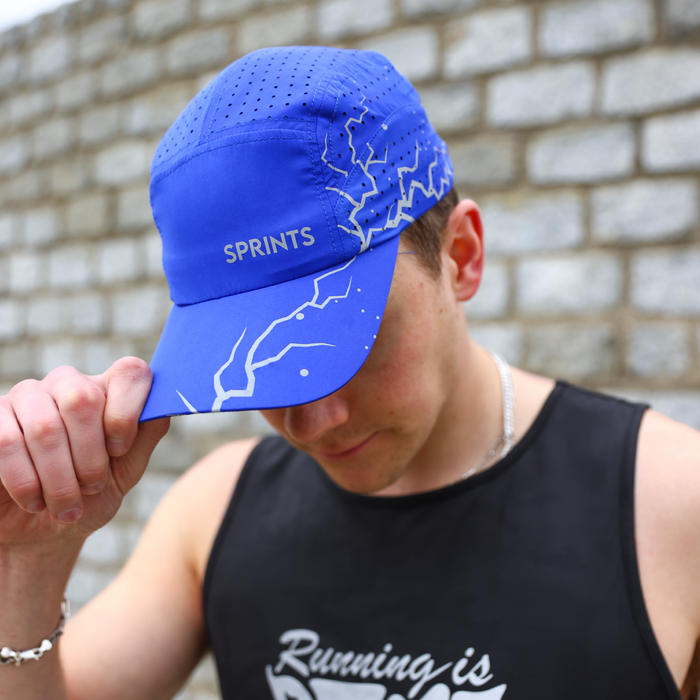 Person wearing the Shockwave Neon Blue Flash Reflective HyperG hat