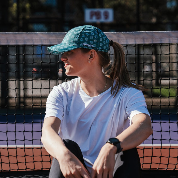 Runner wearing the Social Dinker OG Hat