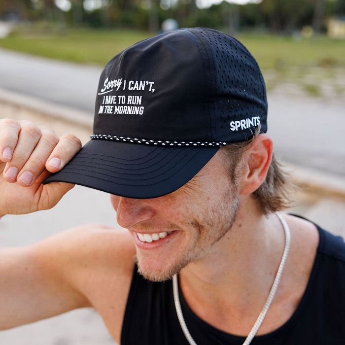 Runner wearing the Sorry I Can't EZ Rope Snapback Hat