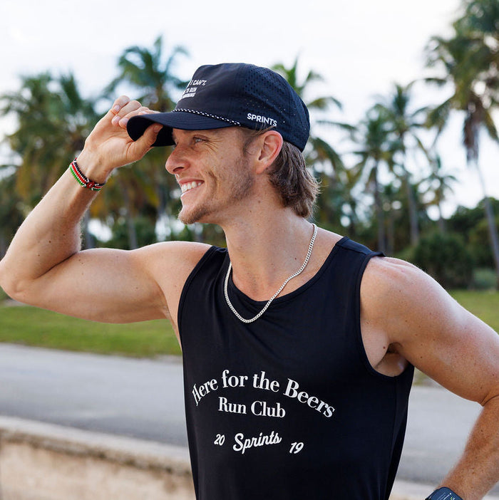 Runner wearing the Sorry I Can't EZ Rope Snapback Hat outdoors