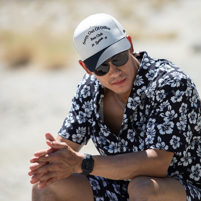 Runner wearing the Sorry, Out Of Office Run Club VP Hat