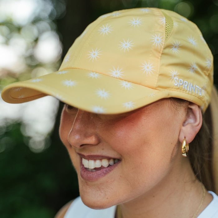 Runner wearing the Sunburst Butter OG Hat