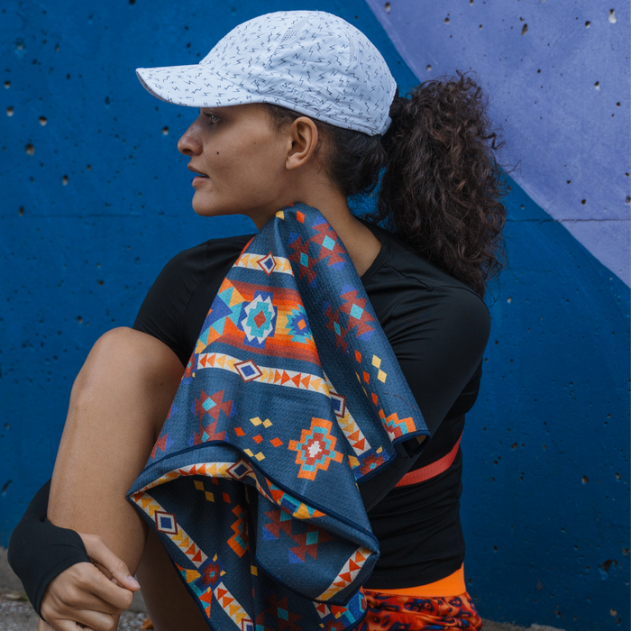 Runners wearing the Supercell Flash Reflective OG hat during a group run