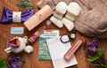 The Sweetest Rest & Recovery Box features cozy socks, a water bottle, tea, a planner, and more—thoughtfully arranged to create the perfect cancer recovery gift that encourages rest, relaxation, and comfort.