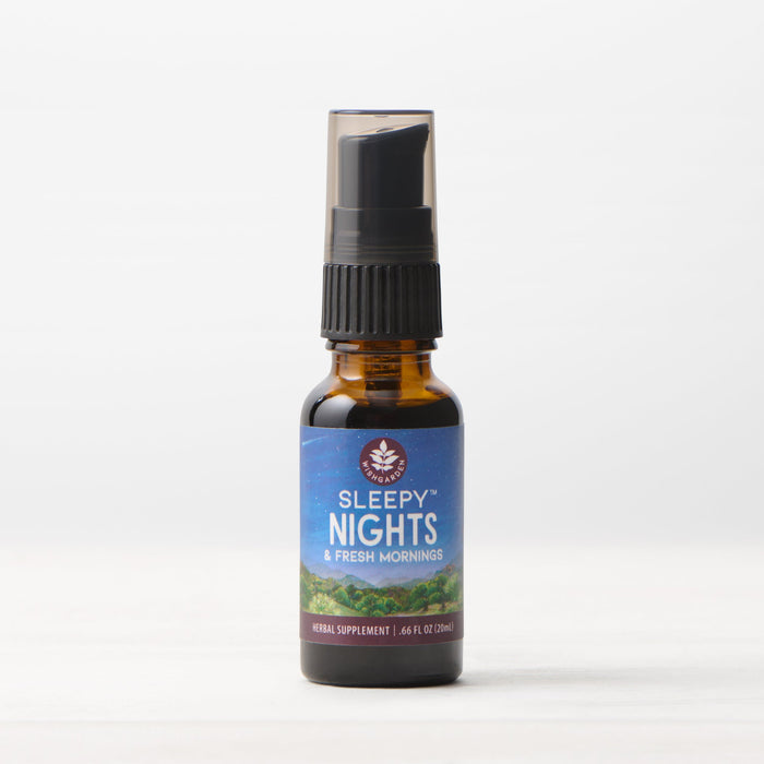 A small amber bottle with a black pump cap labeled Thrive All Day 3-Pack sits on a white surface—ideal for your daily herbal routine and gentle stress support, set against a plain white background.