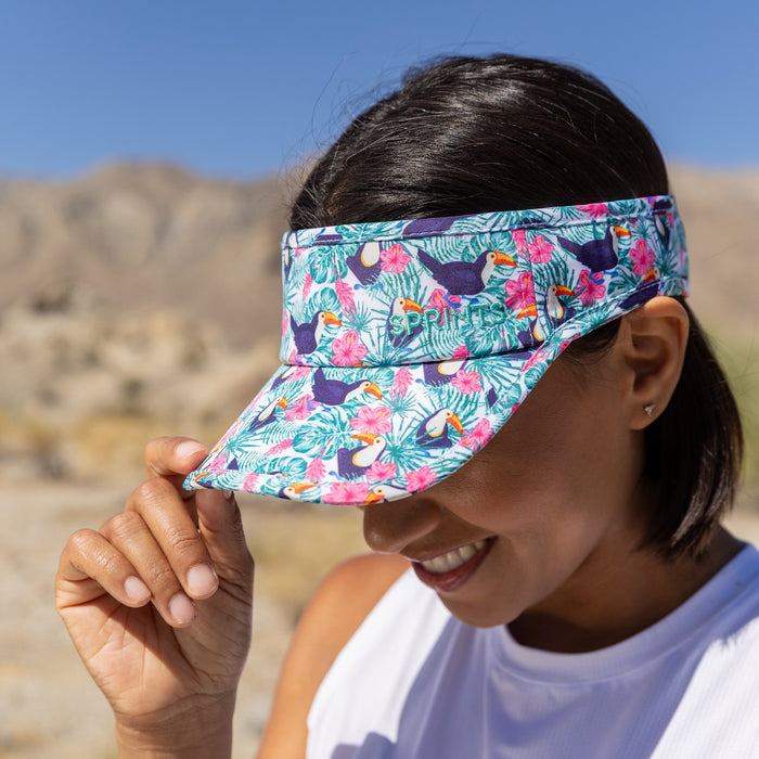 Runner wearing the Toucan Do It Visor at the coast