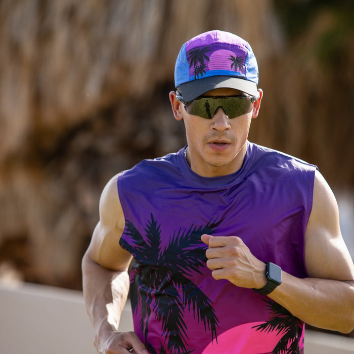 Runner wearing the Tropic Twilight HyperG Hat