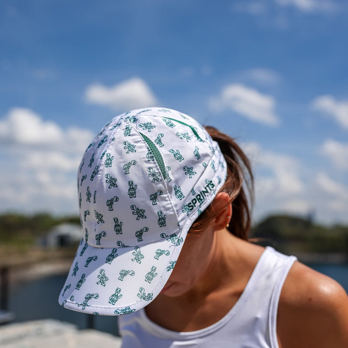 Runner wearing the Turtles OG Hat, side view