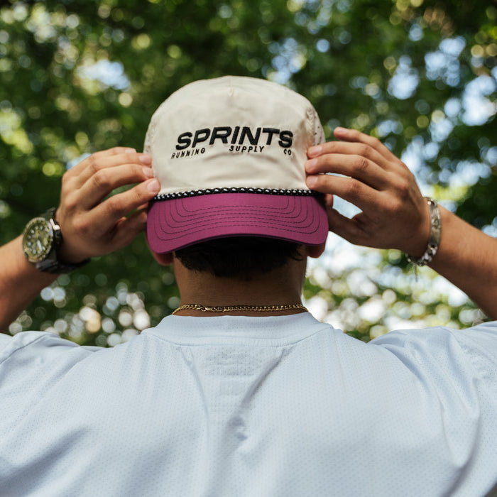 Runner wearing the Velocity Sprints Catalina EZ Rope Snapback Hat