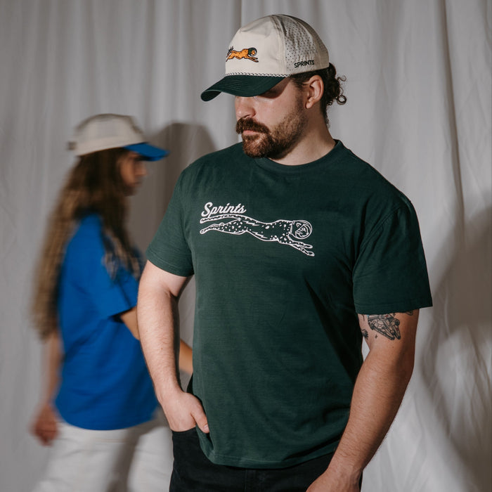 Person wearing the Victory Sprints Luxe Suprima Cotton Tee in Green