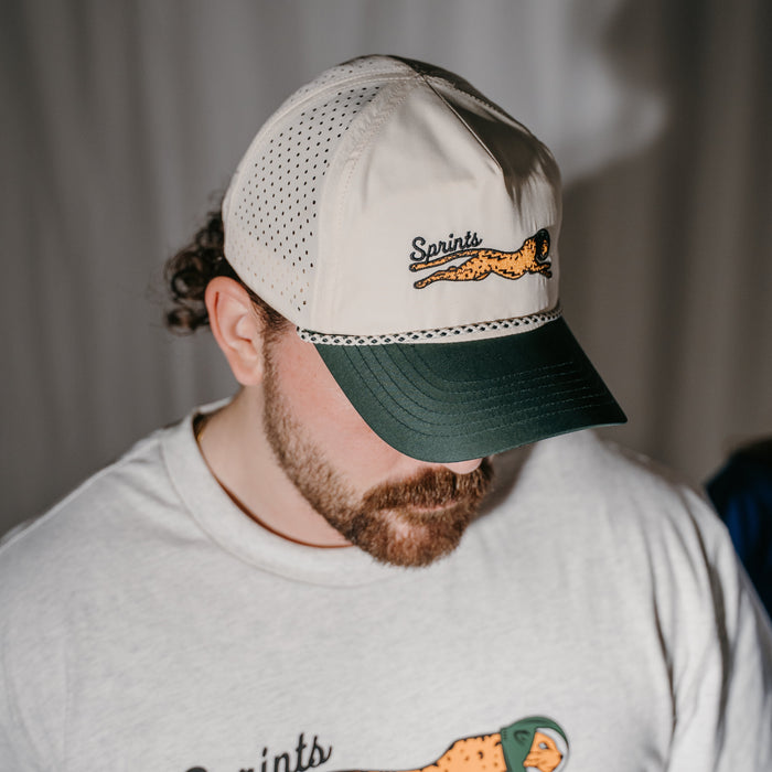 Person wearing the Victory Sprints Max Relax Green EZ Rope Snapback Hat