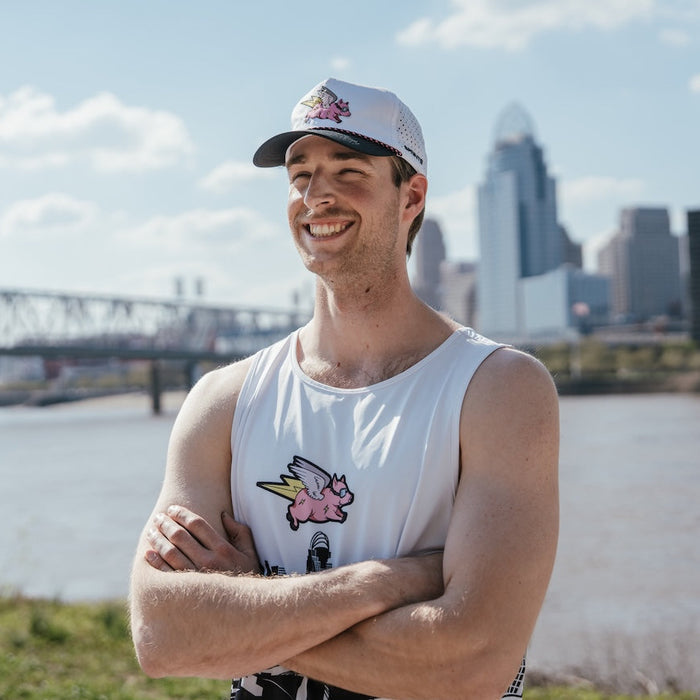 Person wearing the We Run Cincy 2026 EZ Rope Snapback Hat