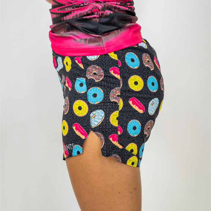 Woman wearing the Avigate 4 inch Mercy Short in Donuts print, close-up