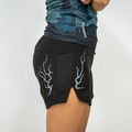 Woman wearing the Avigate 4 inch Mercy Short in Dystopian print