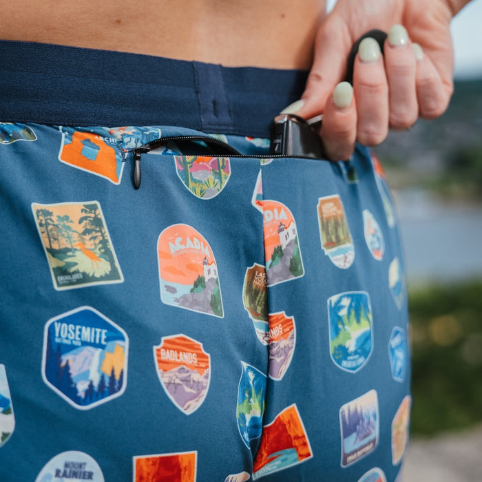 Woman wearing the Avigate 4 inch Mercy Short in National Parks print, close-up