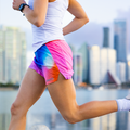 Woman wearing the Avigate 4 inch Mercy Short in Skiddle Stratification print