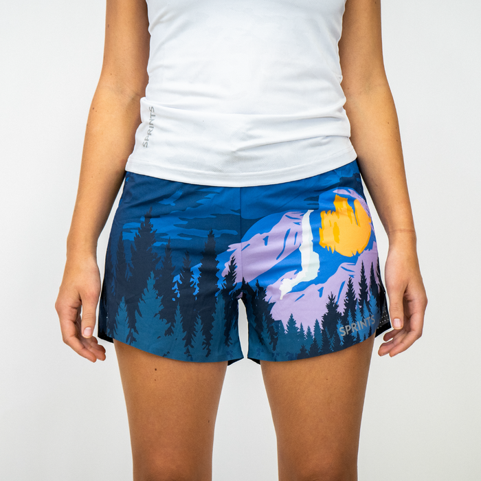 Woman wearing the Avigate 4 inch Mercy Short in Yosemite print, close-up