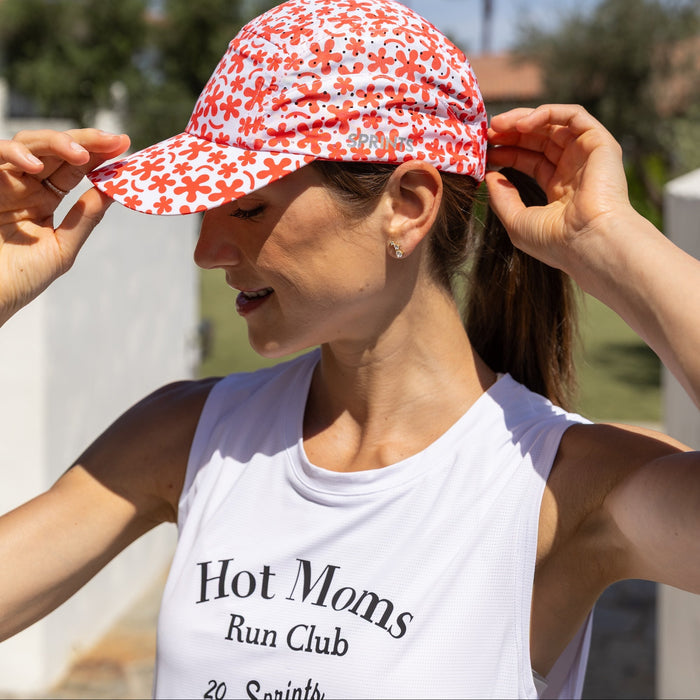 Woman wearing the Core Zero Framework Tank in Hot Moms print, side view