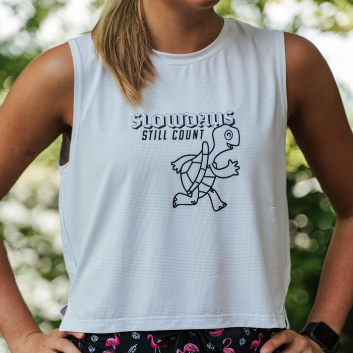 Woman wearing the Core Zero Framework Tank in Slow Days Still Count print