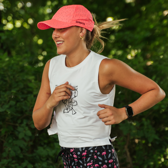Woman wearing the Core Zero Framework Tank in Slow Days Still Count print, side view