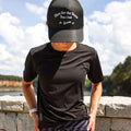 Woman wearing the Core Zero Tech Tee in Vault Jag Black