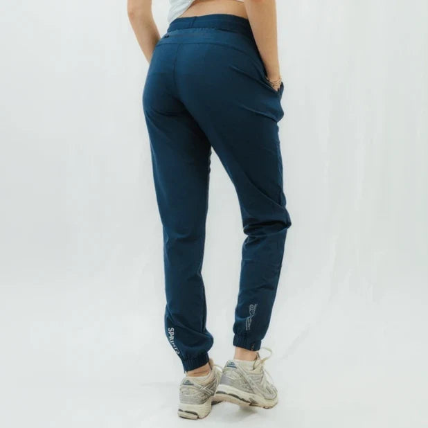 Woman wearing the Echelon Jogger in Stealth Navy, close-up