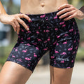 Woman wearing the Flexion 5 inch Compression Short in Find the Fauxmingo Black