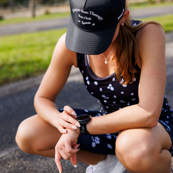 Woman wearing the Florid Declamation Running Tank, close-up