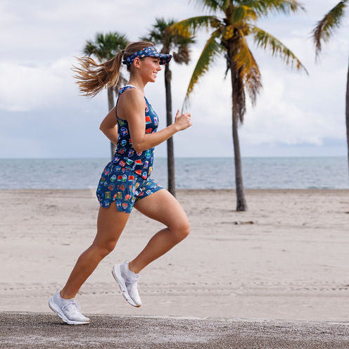 Woman wearing the National Parks Running Tank, side view