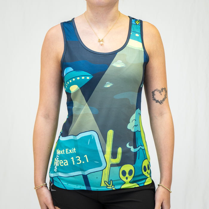 Woman wearing the Uninvited Alien Antics Running Tank